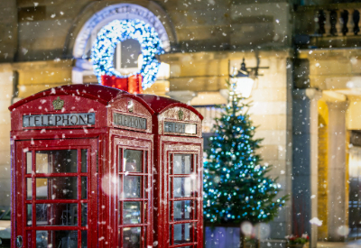 Snow falls over London's iconic red phone boxes